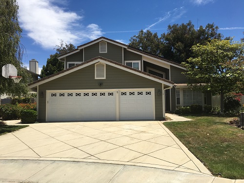 painting wood siding home in thousand oaks, ca