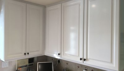 Interior kitchen cabinet painting by CertaPro house painters in Newbury Park, CA