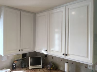 Interior kitchen cabinet painting by CertaPro house painters in Newbury Park, CA