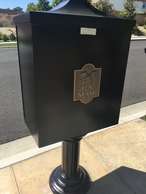 Front Side of a Black Painted HOA Community Mailbox in Moorpark, CA by CertaPro Preview Image 1