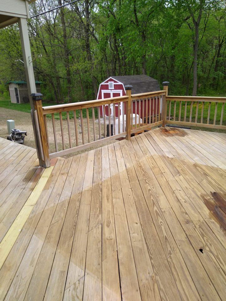 This deck was returned to a uniform finish with a good staining Before