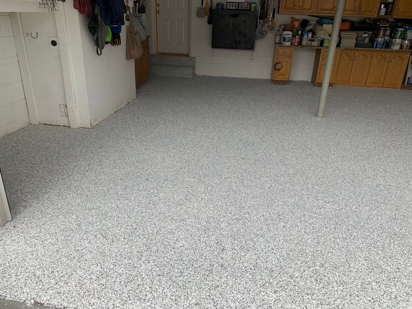 garage with concrete flooring and epoxy coating