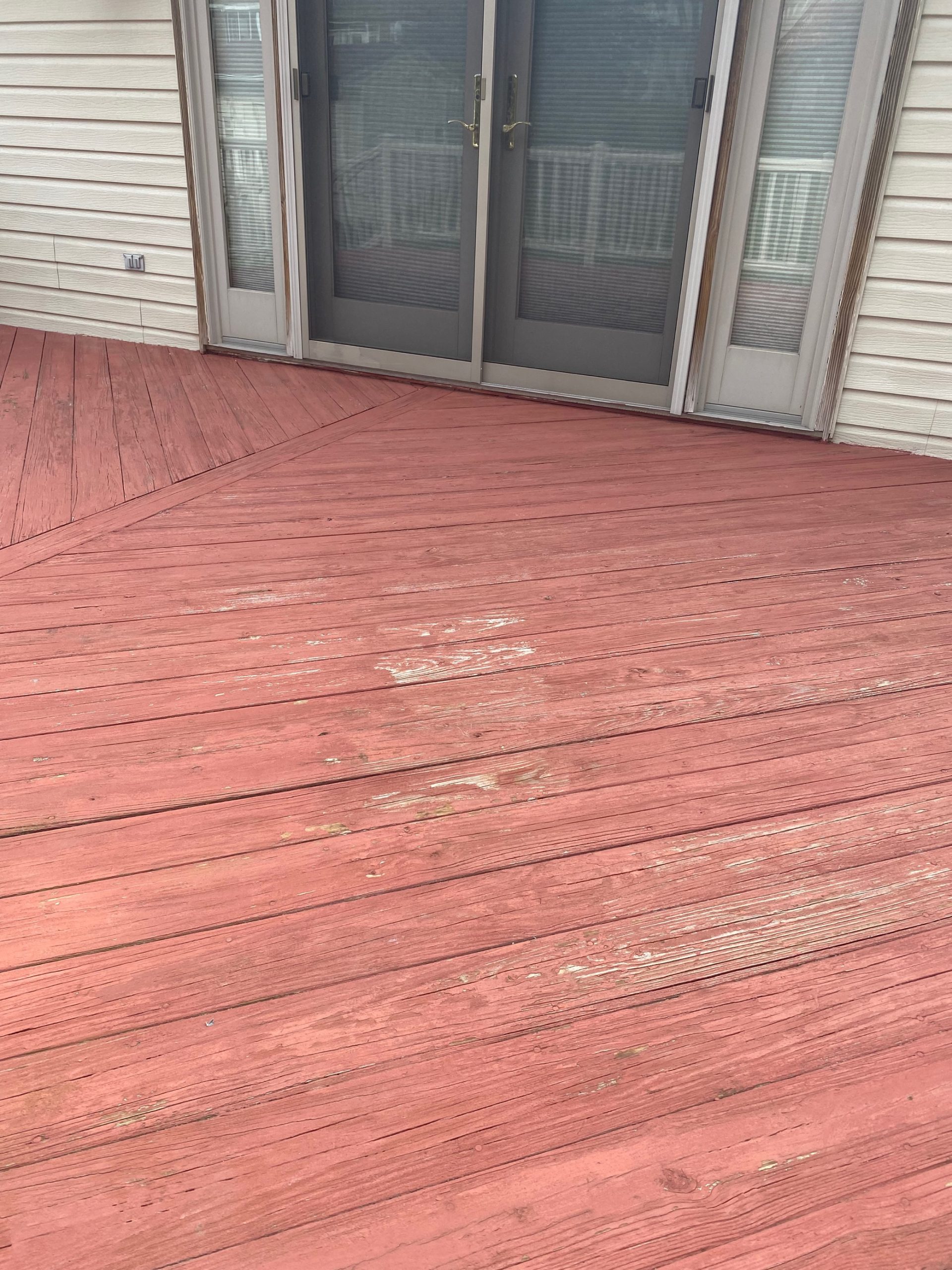 Before Deck Painting with faded and chipped paint