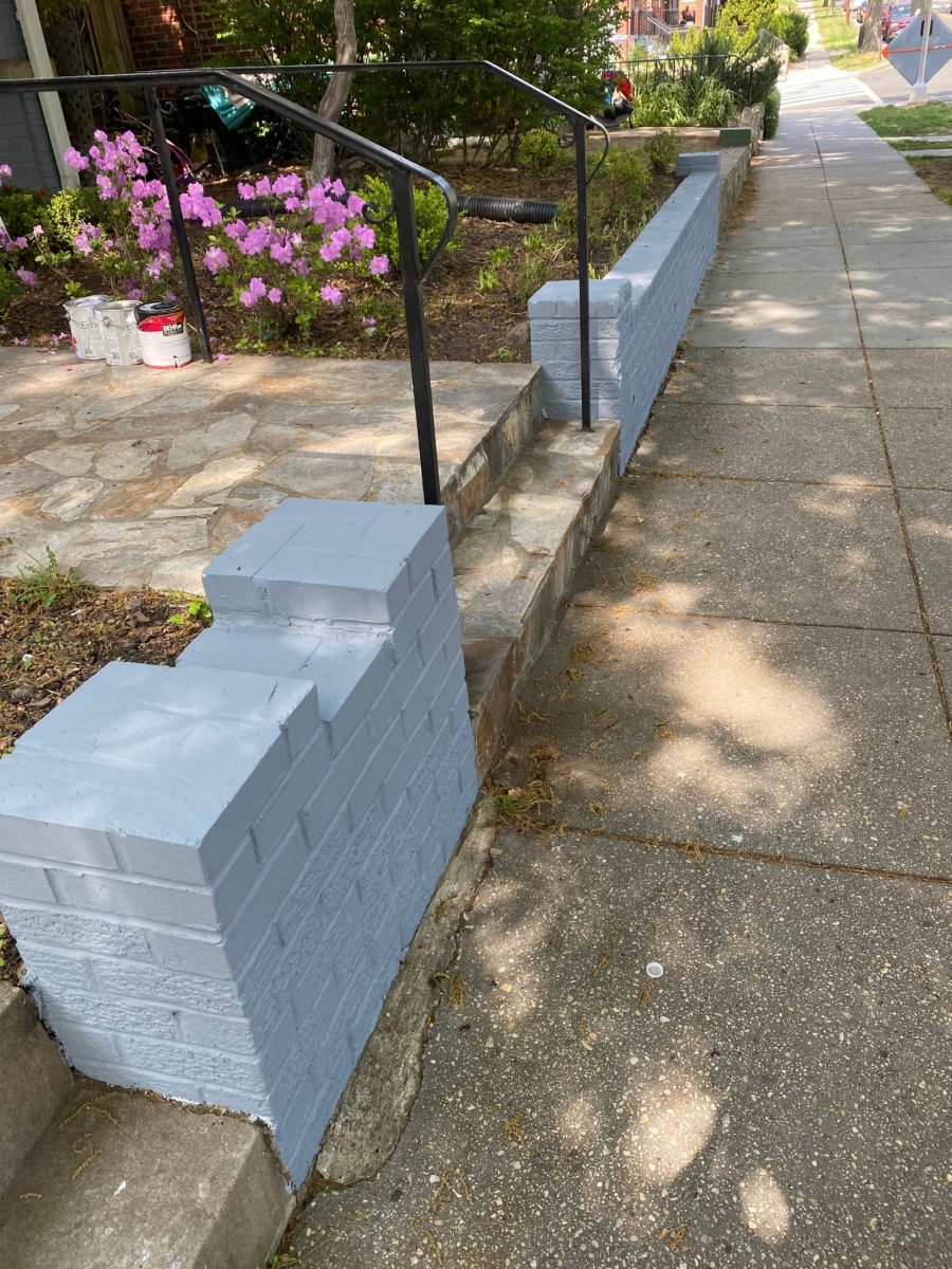 brick fence near sidewalk repainted gray to match house color Preview Image 2