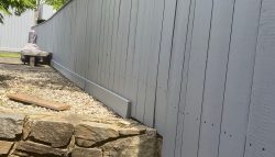 Fence Repainted a Neutral Gray coat