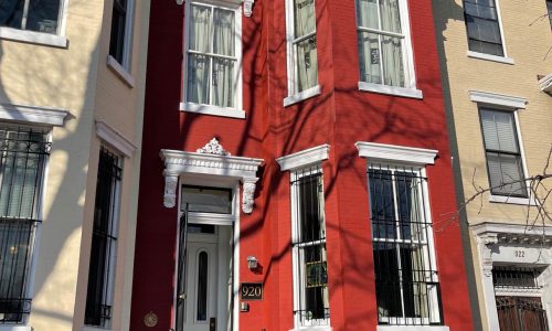 Dramatic Red Row House