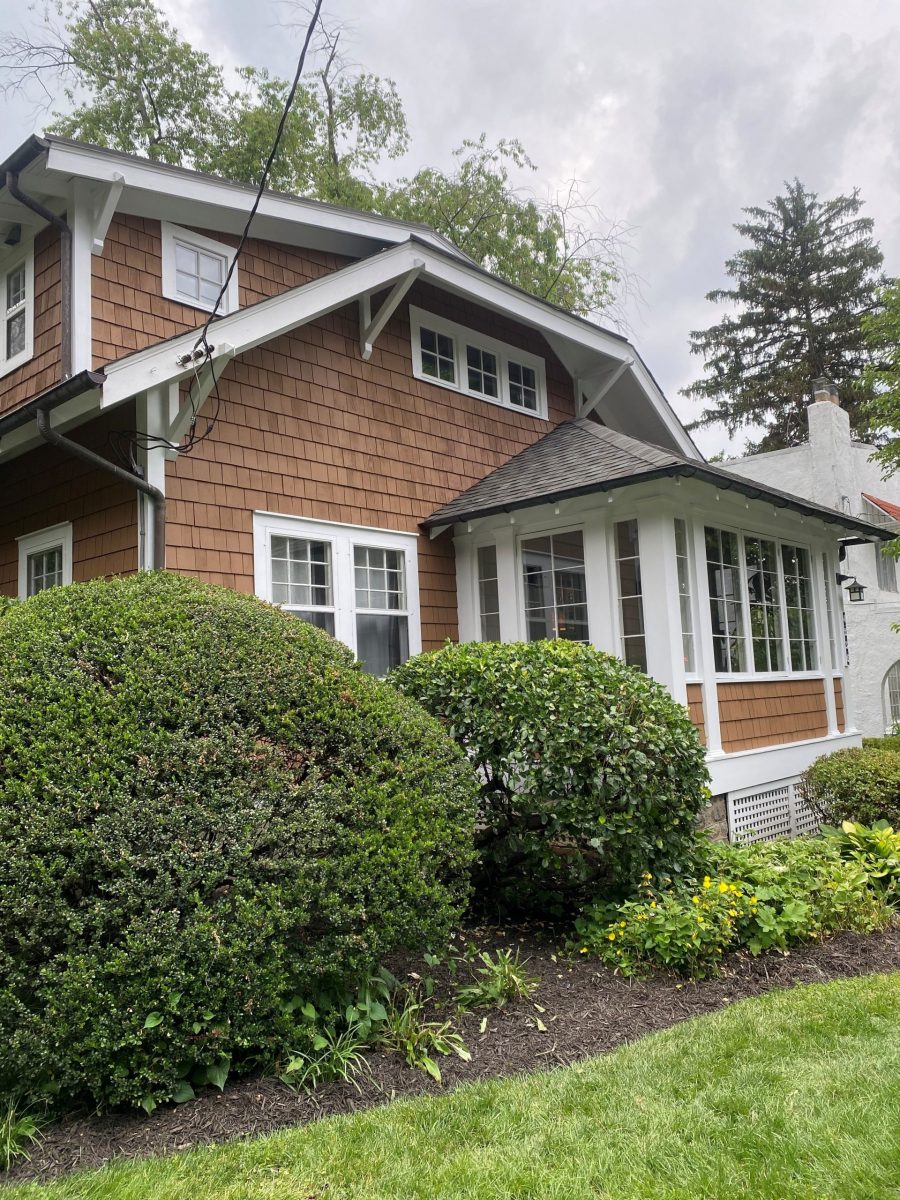 side of house with cedar shake siding and white trim Preview Image 7