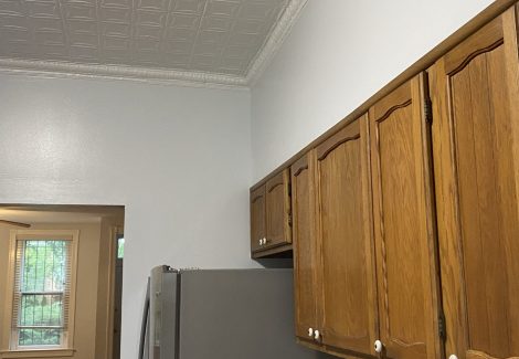 kitchen wall cabinets above refrigerator