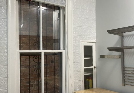 window in home kitchen next to counter