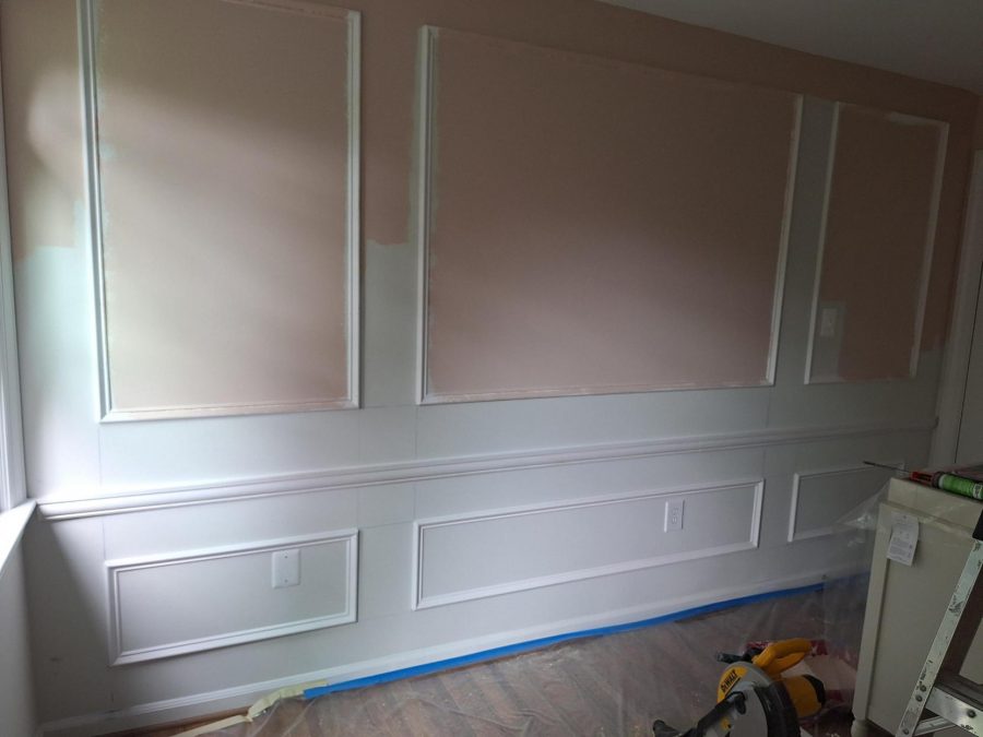 wall with wainscoting trim and partial pink paint Preview Image 2