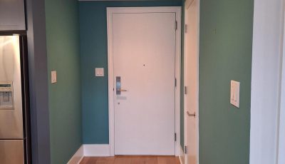 home with green accent wall