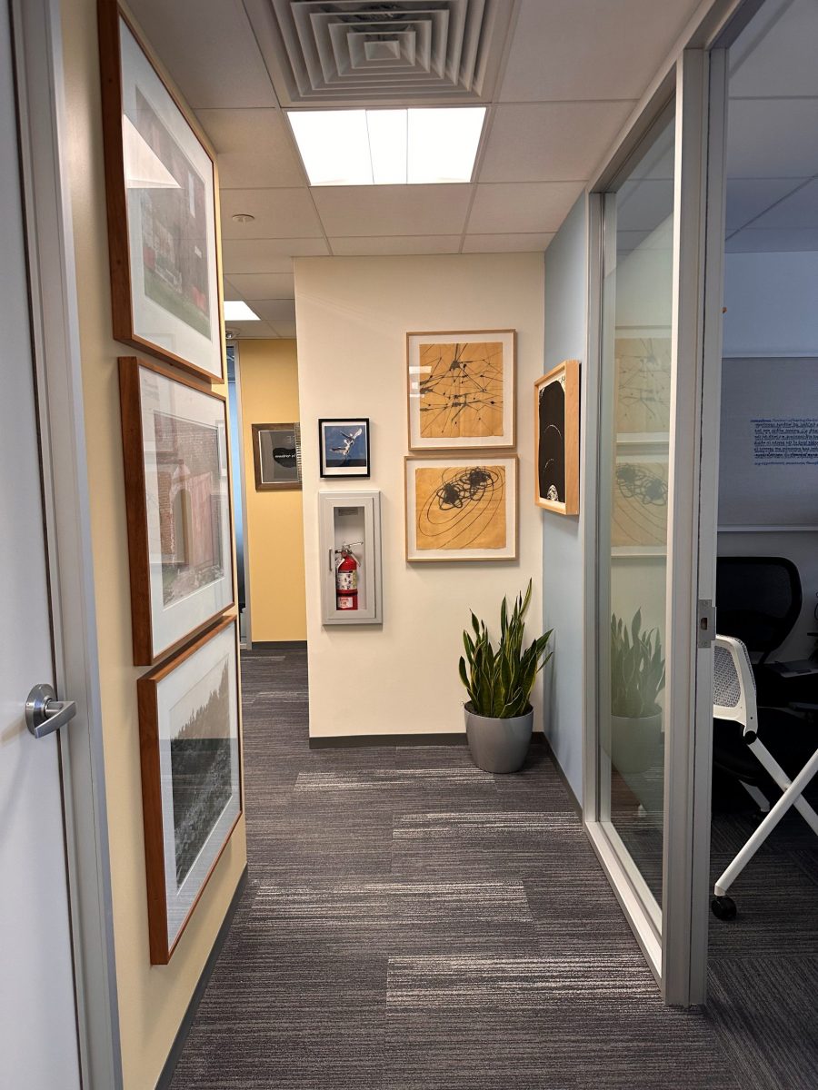 office hallway with framed artwork on walls Preview Image 1