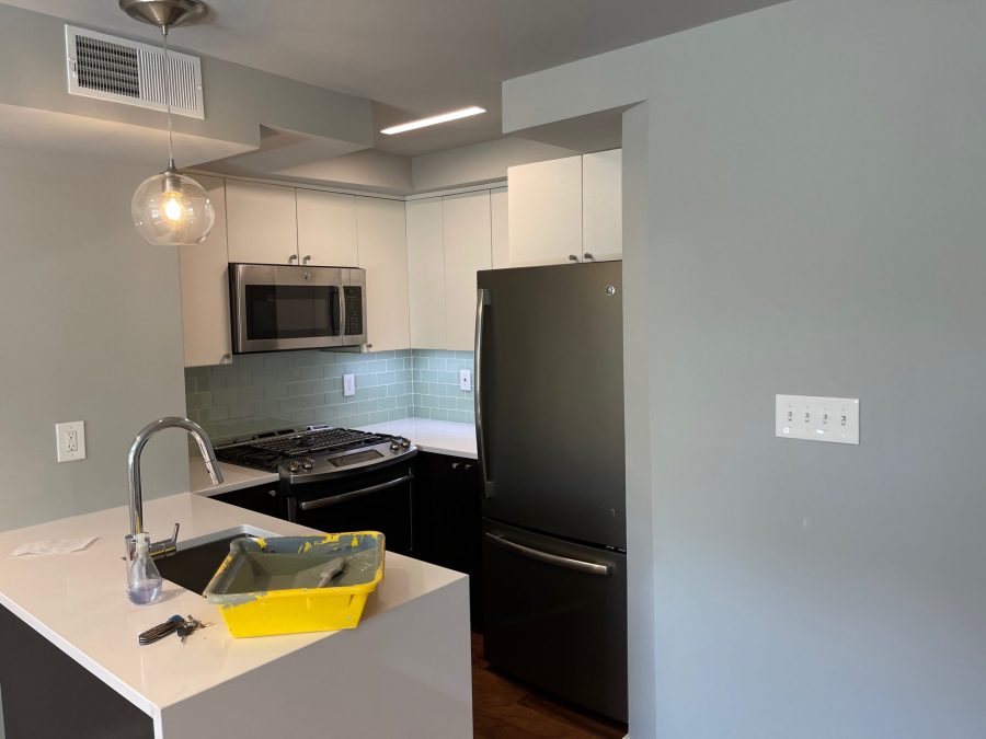 kitchen area repainted light gray