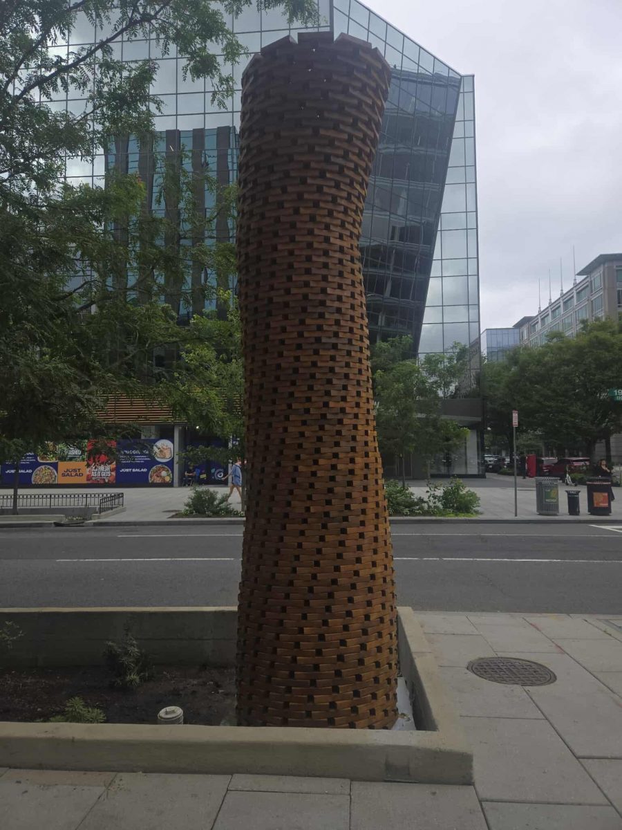 wooden art installation sculpture on city sidewalk Preview Image 5