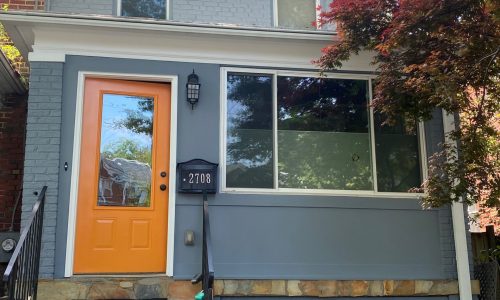 Exterior House Painting with Orange Door