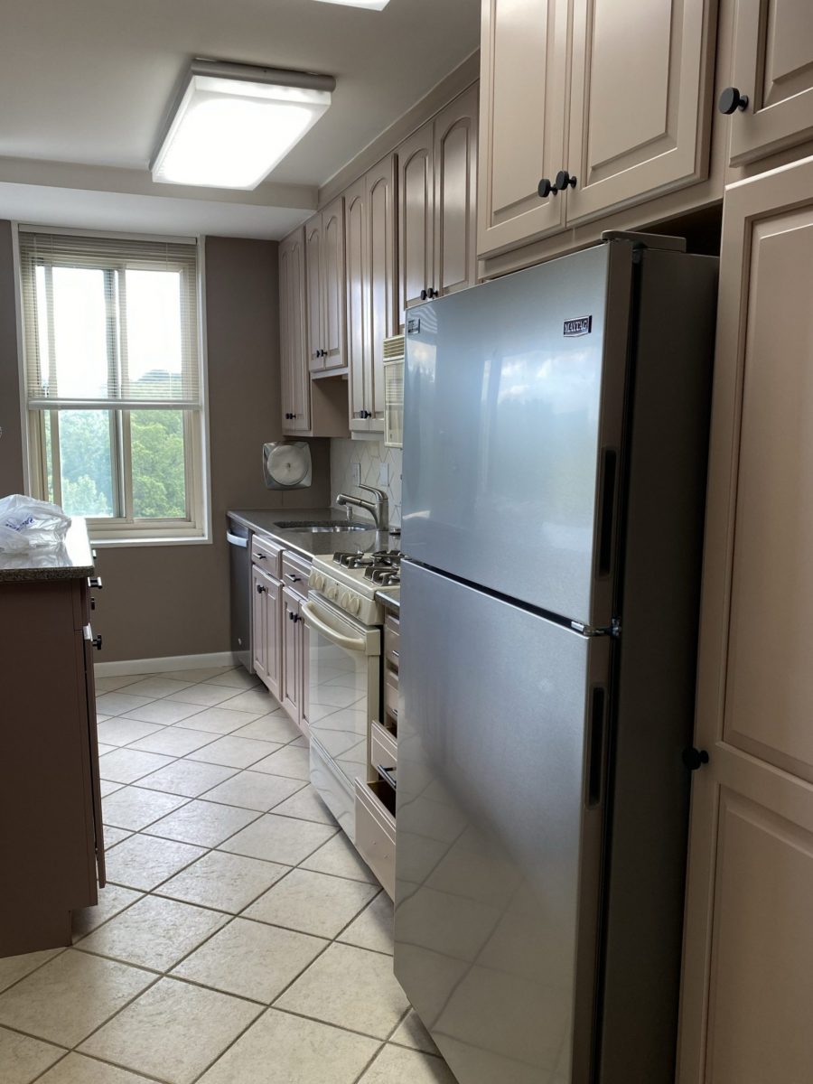 painted kitchen cabinets surrounding appliances Preview Image 3