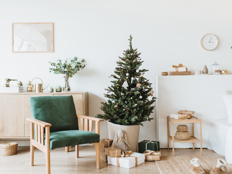 green chair and christmas tree
