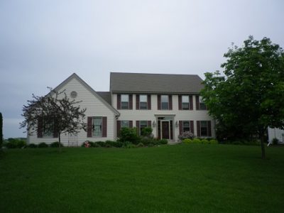 Exterior painting by CertaPro house painters in Menomonee Falls, WI