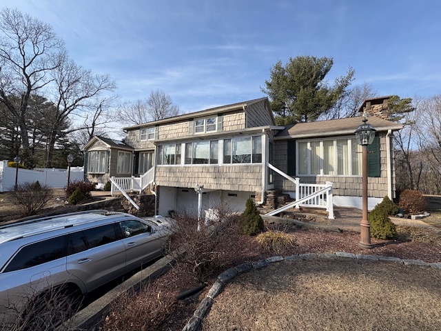 before photo of exterior of house tan