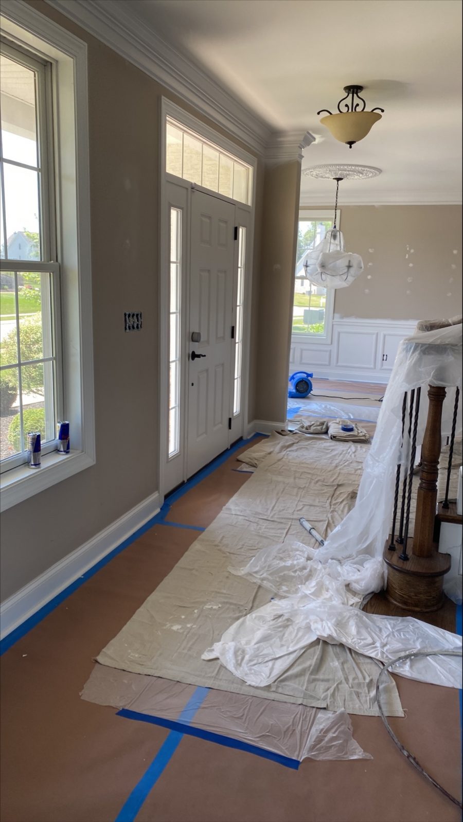 house interior covered up by our team to prevent mess while painting Preview Image 2