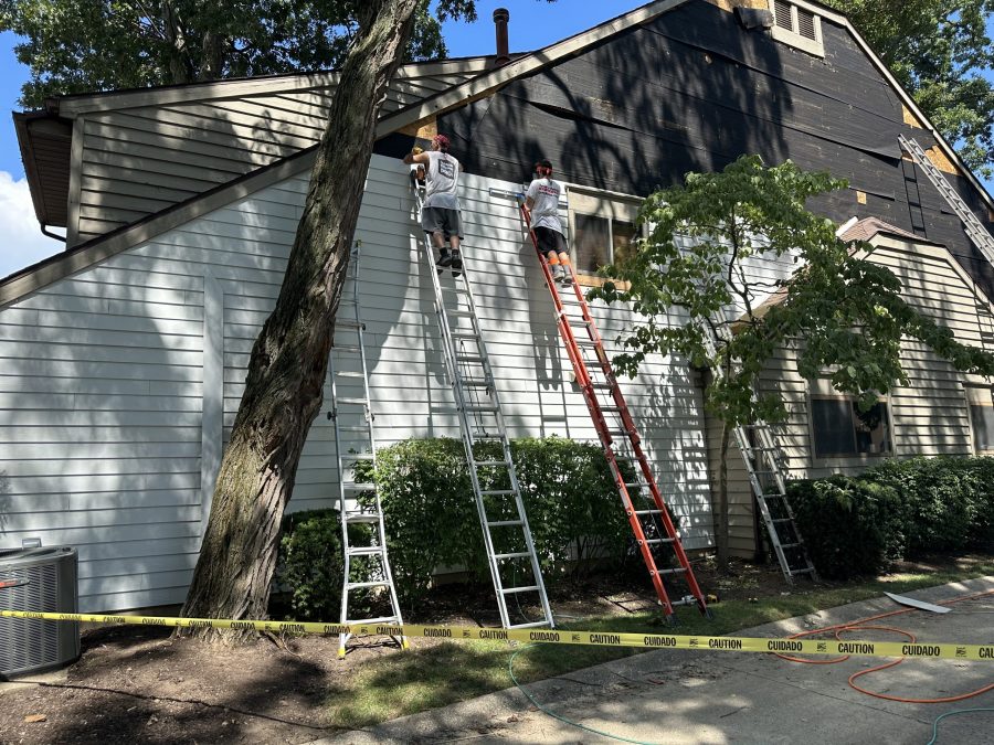 photo of exterior being repainted and refinished Preview Image 5