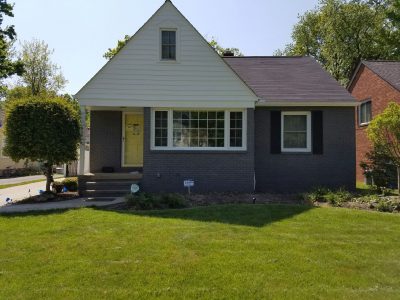 bay village gray brick exterior painting