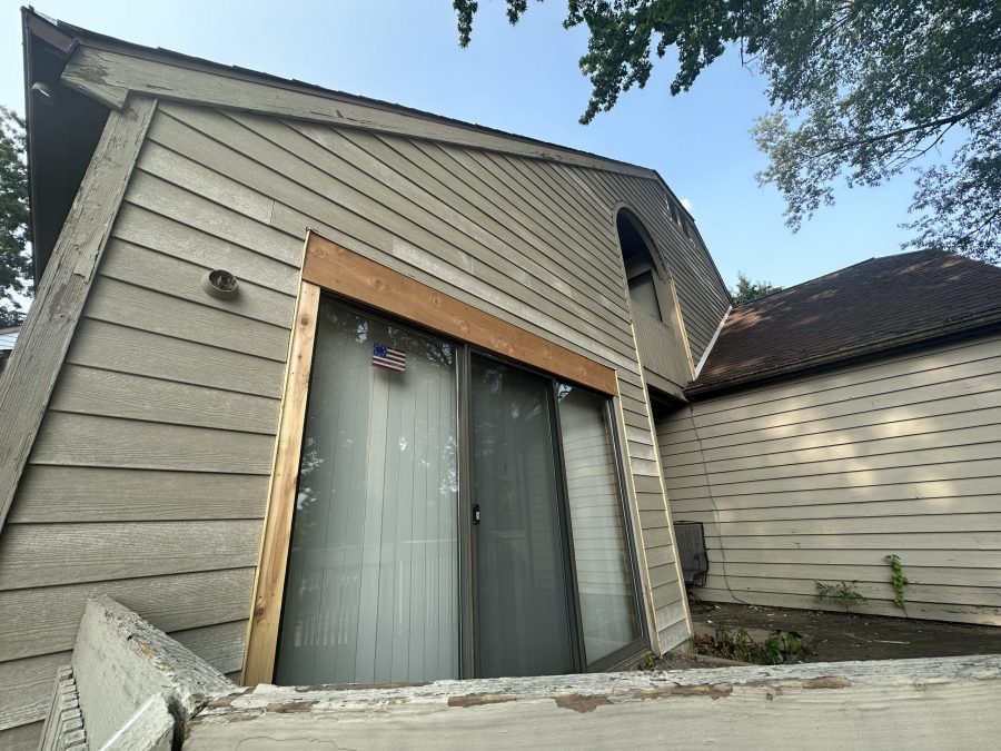 photo of exterior being repainted and refinished Preview Image 6