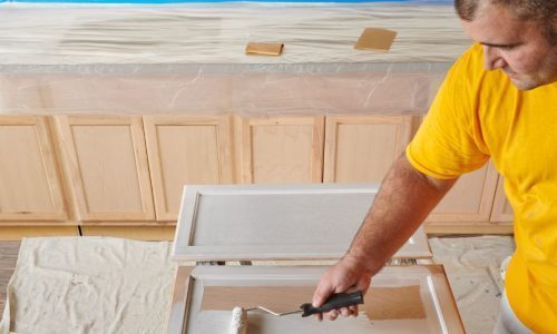 Paint / Stain is Applied to Cabinet Doors