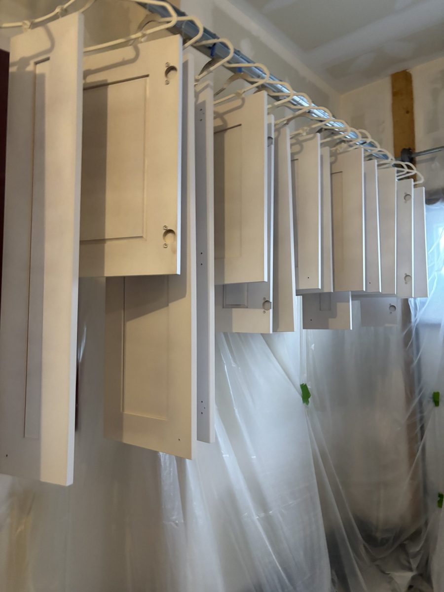 painted cabinet doors hanging while drying Preview Image 6