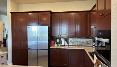 home kitchen with dark painted cabinets