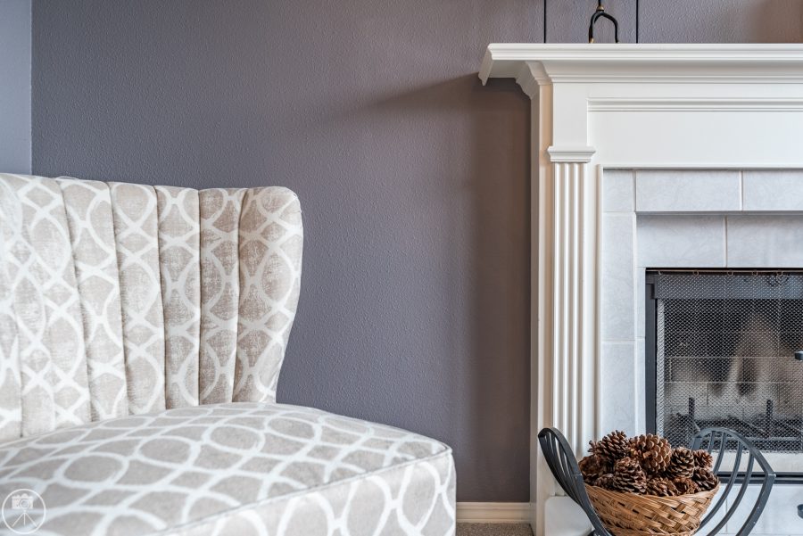purple wall with white fireplace painting