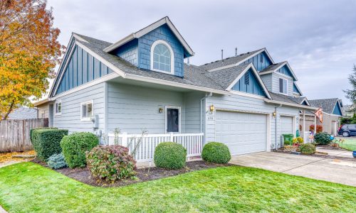 Lawn View - Light Grey Townhome with Blue Attics, a Dark Grey Roof & White Trim