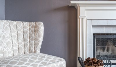 purple wall with white fireplace painting