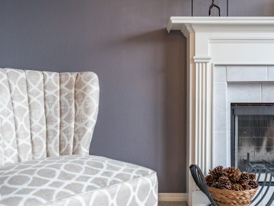 purple wall with white fireplace painting