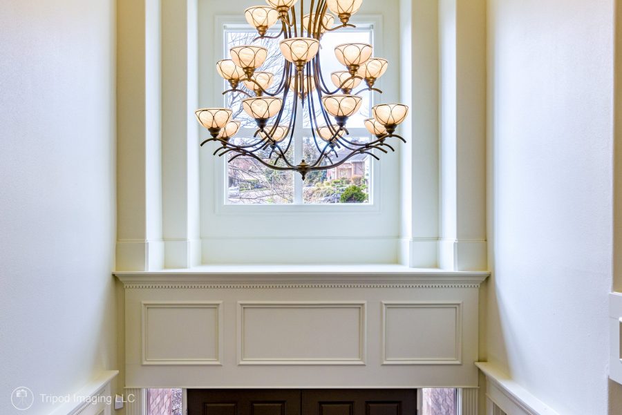 chandelier in foyer off white