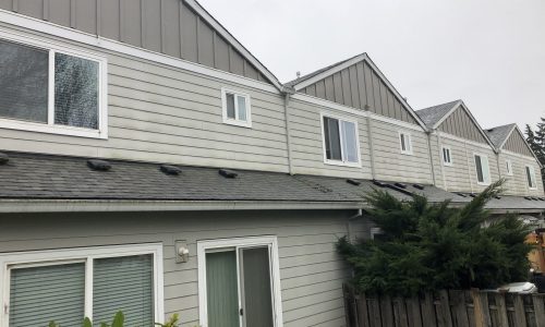 Faded Paint & Trim at each Townhomes' Rear
