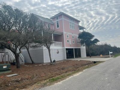 completed exterior house painting project in oak island, nc, by certapro painters of wilmington, nc