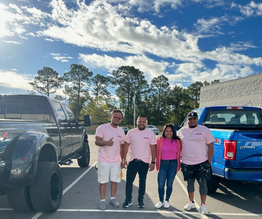 Certapro painters of wilmington, nc, team posing for picture at commercial job site Preview Image 2