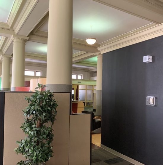 office painted white and dark grey by certapro painters of winnipeg west, mb