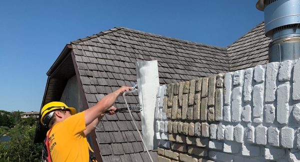 Chimney painted white in Dumbarton, MB