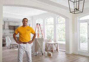 certapro painter working on interior of home
