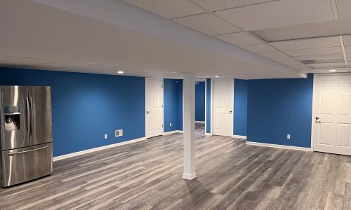 Blue Walls With White Trim in Basement