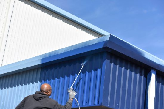 painting in progress blue roof line