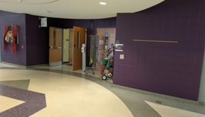 dark purple painted school lobby wall
